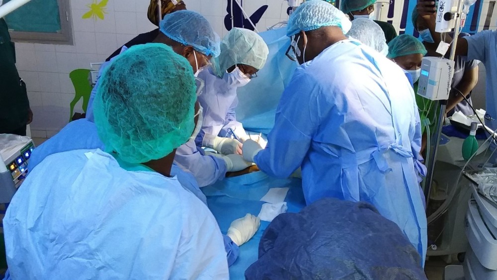 The surgical team operating on the cojoined twins